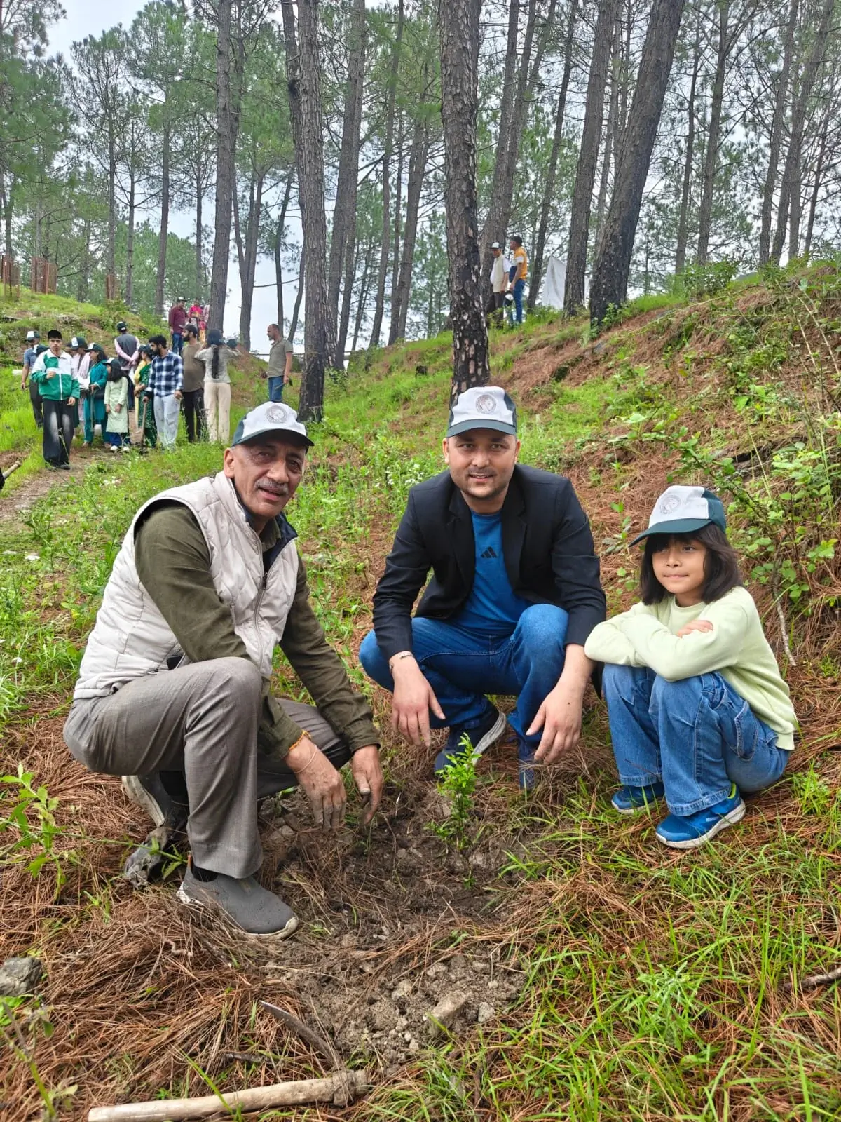 Community members at a Vasudhra plantation drive